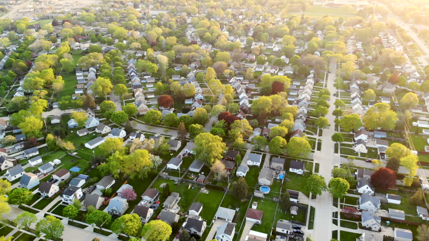 Aerial View Of Residential Houses At Spring May Establishing Shot Of American Neighborhood Suburb  Real Estate Drone Shots Sunset Sunlight From Above 