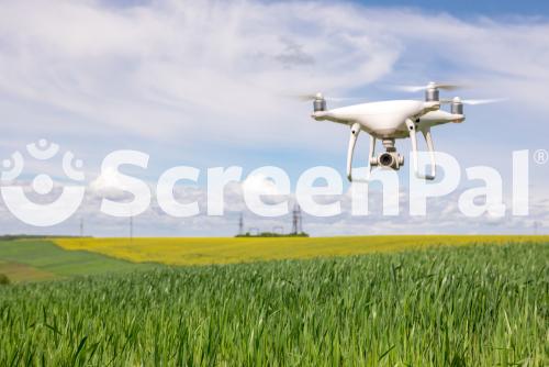 Close Up On White Drone Camera Drone Quadcopter In Flight
