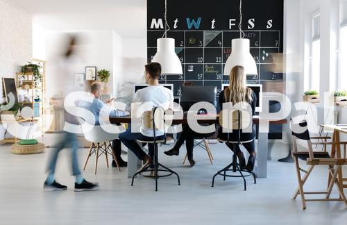People Working In Modern Creative Work Environment
