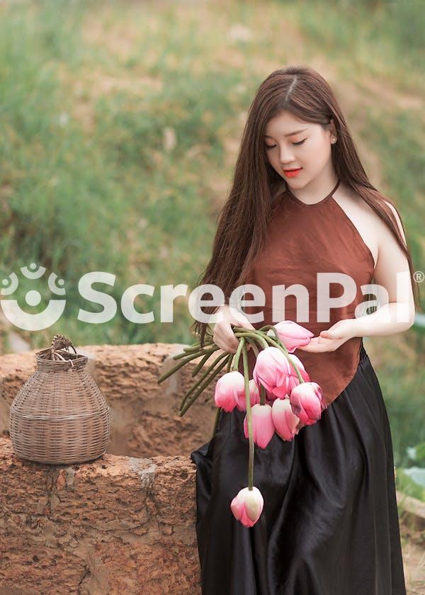 Woman Holding Pink Tulips